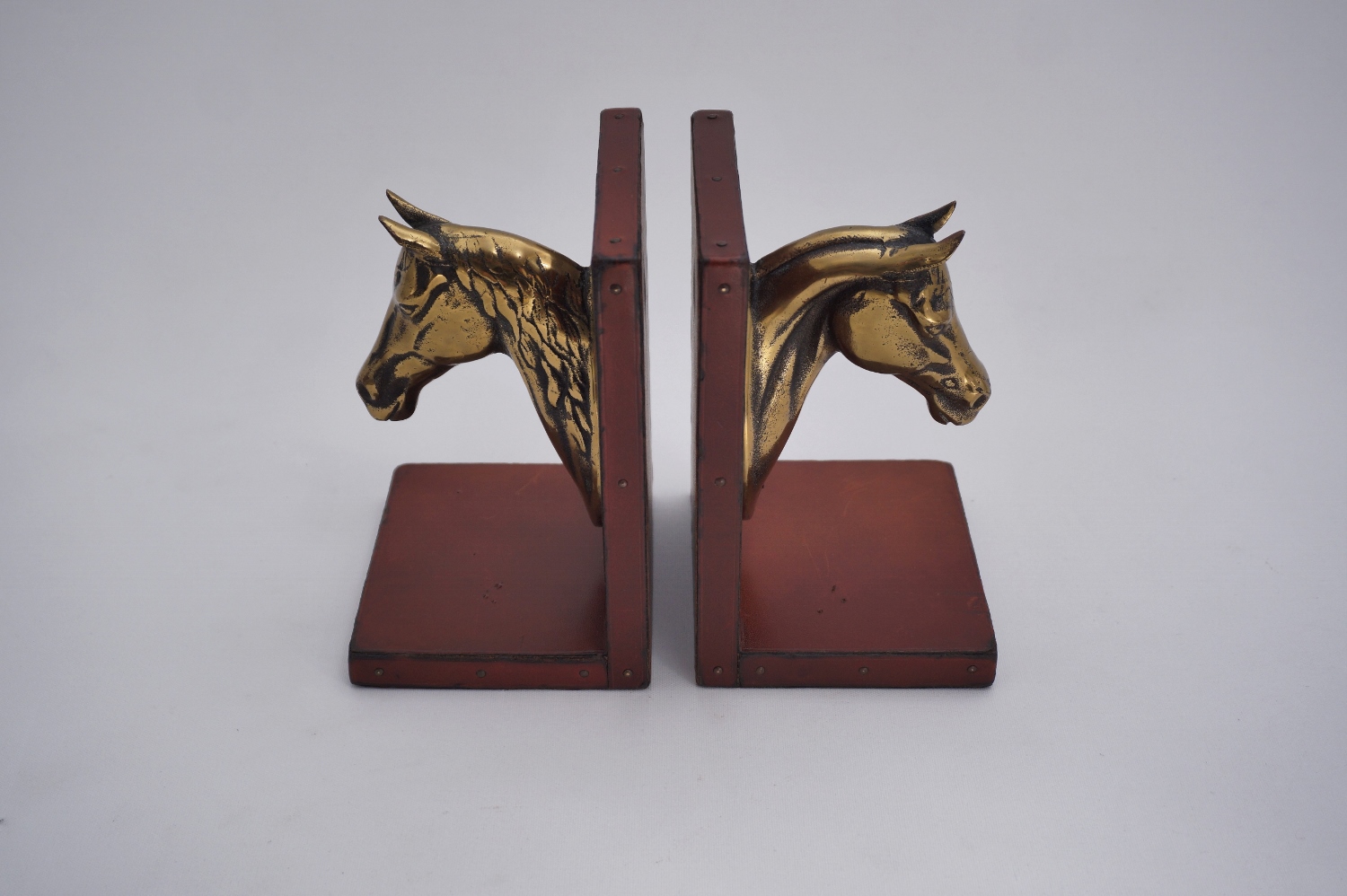 Vintage horse bookends, Maison Charles style, brass & leather 